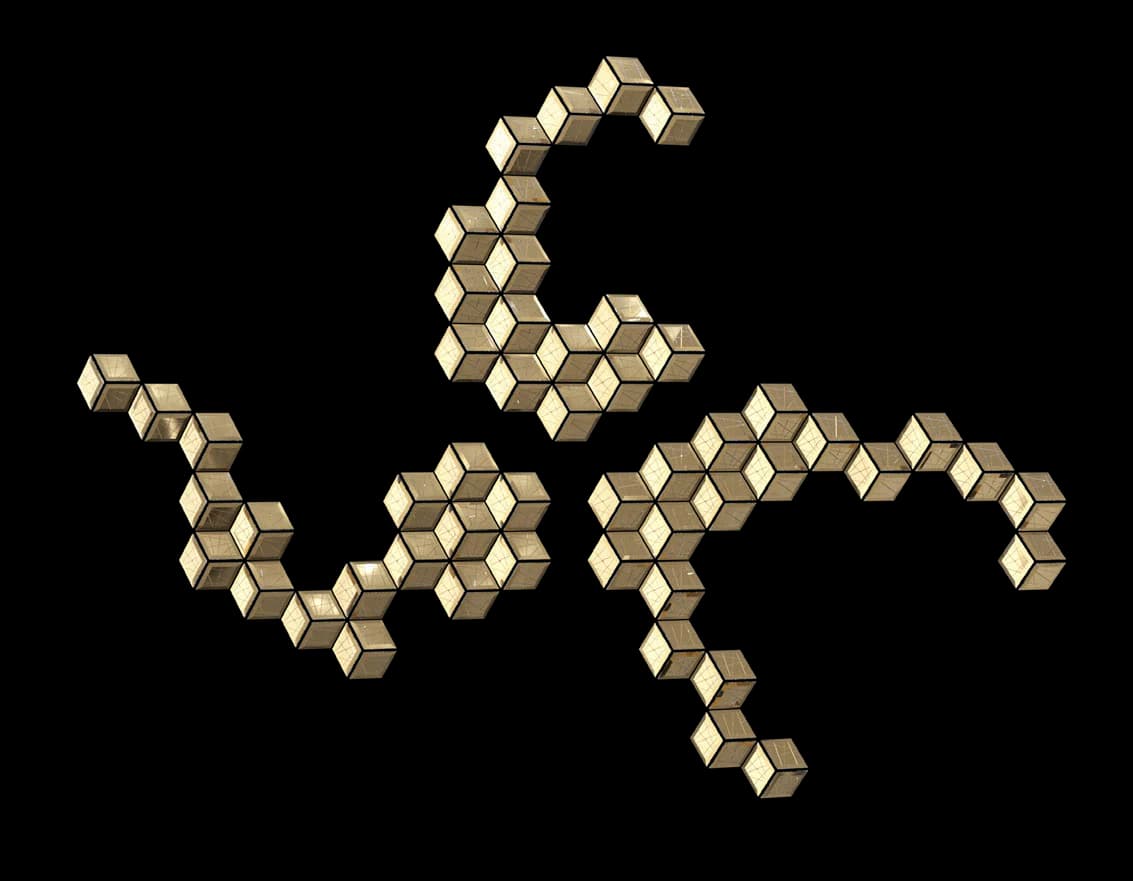 Faceted Wall Installation winding hexagonal module arrangement on black