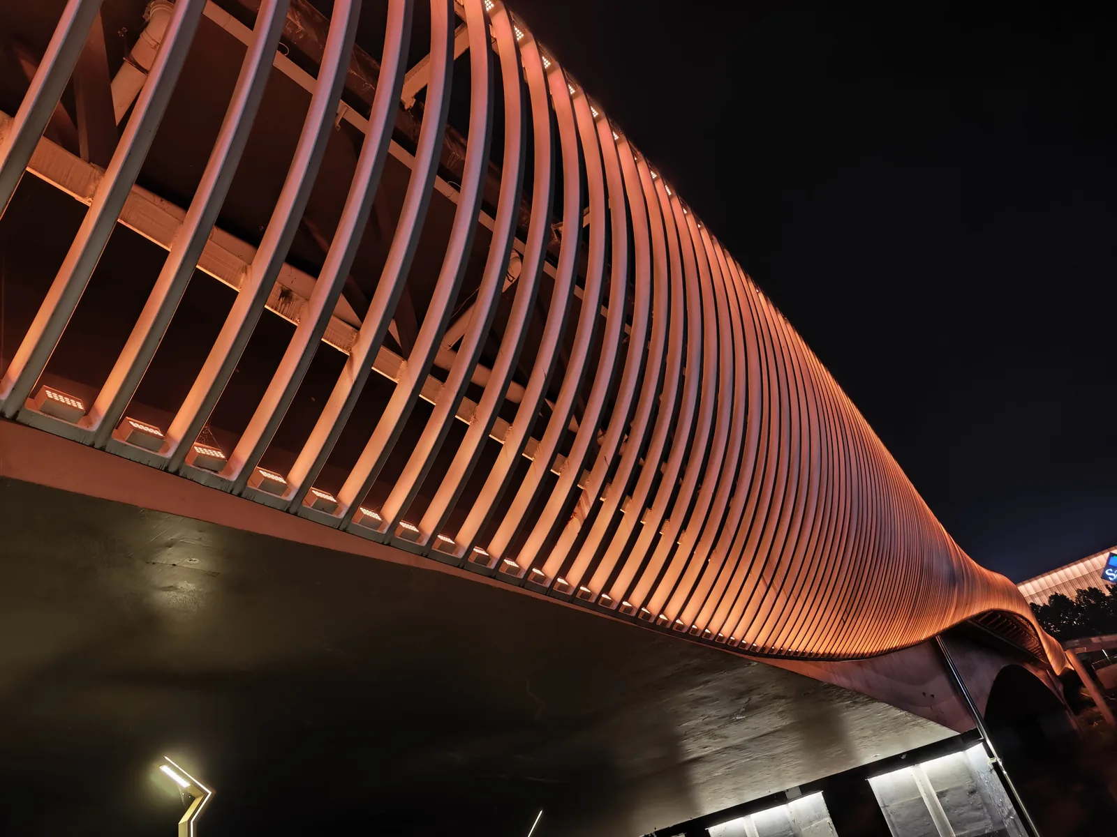 Close view of RGBW bridge floodlights installed behind bridge ribs